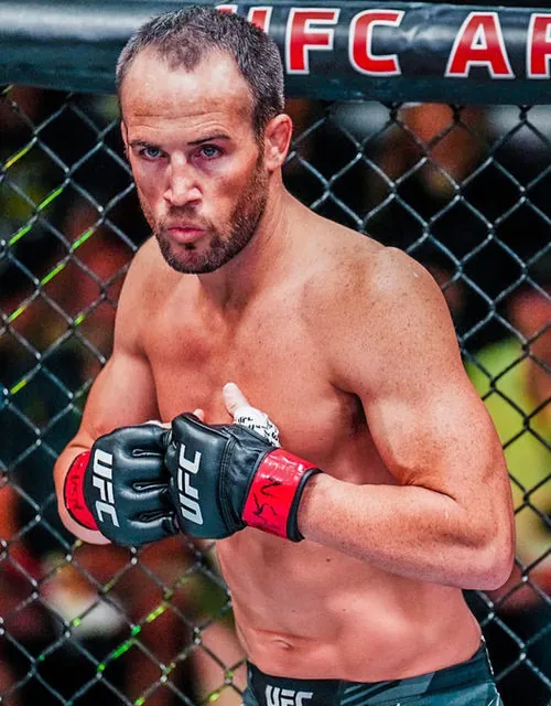 Damon Jackson in fighting stance inside the UFC Octagon